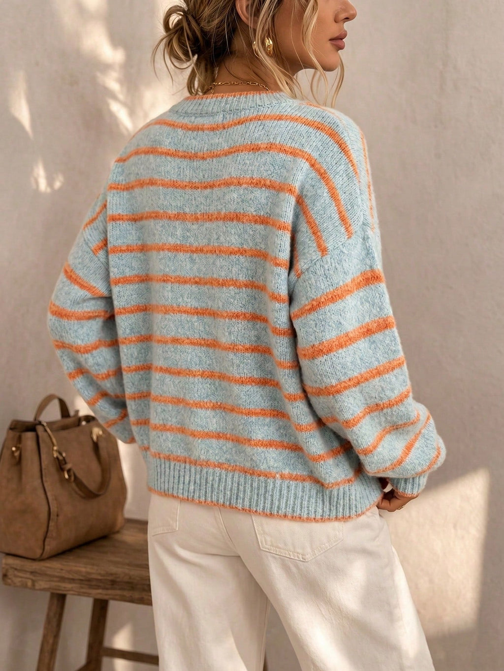 Bennett and Lowe Chelsea striped relaxed-fit knit cardigan for women, featuring a cozy, casual design with blue and white stripes.