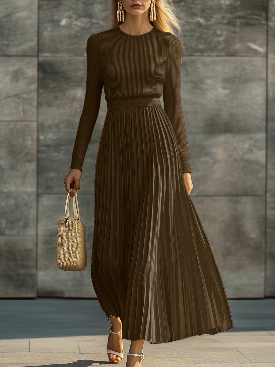 Charlotte ribbed knit pleated midi dress for women by Bennett and Lowe, shown in natural light, highlighting the pleated design and fabric texture.