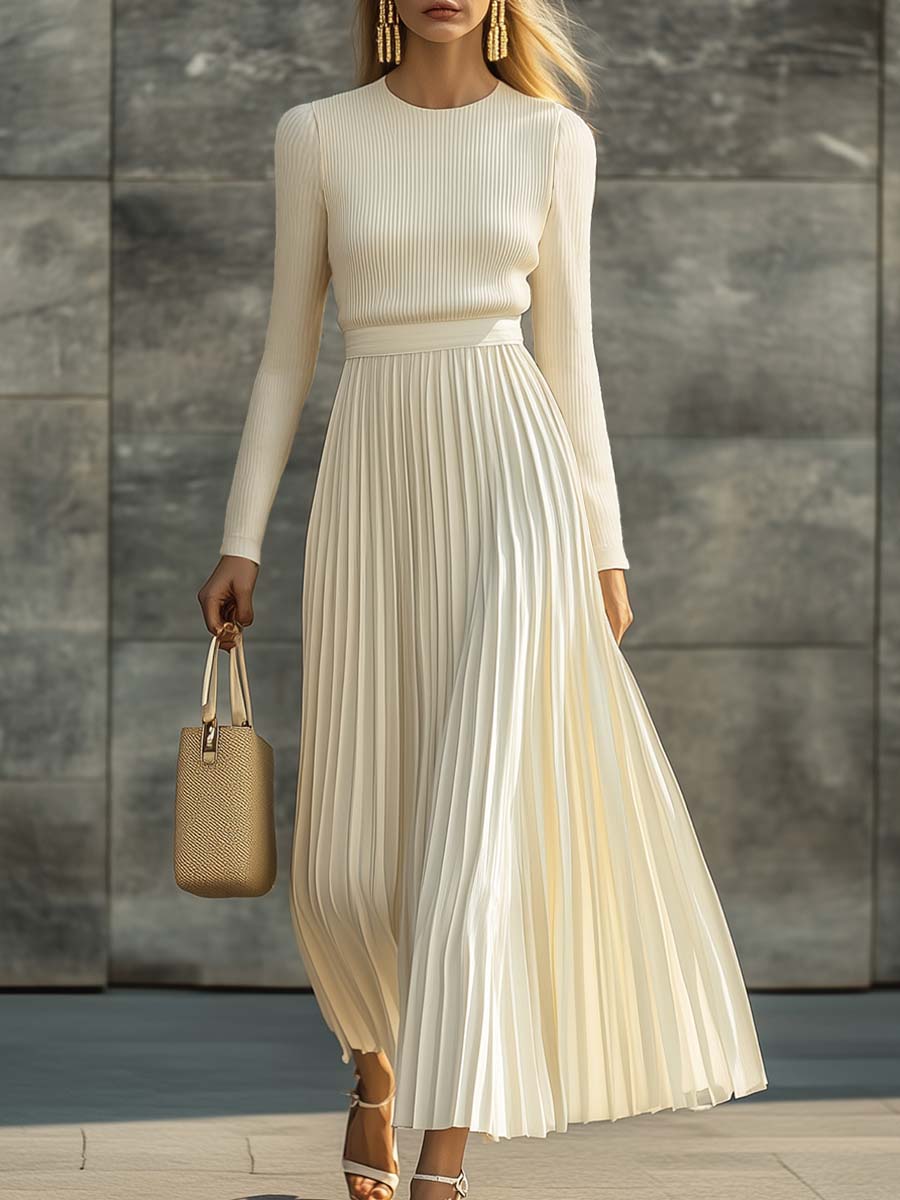 Charlotte ribbed knit pleated midi dress for women by Bennett and Lowe, featuring a fitted bodice and flowing pleated skirt.