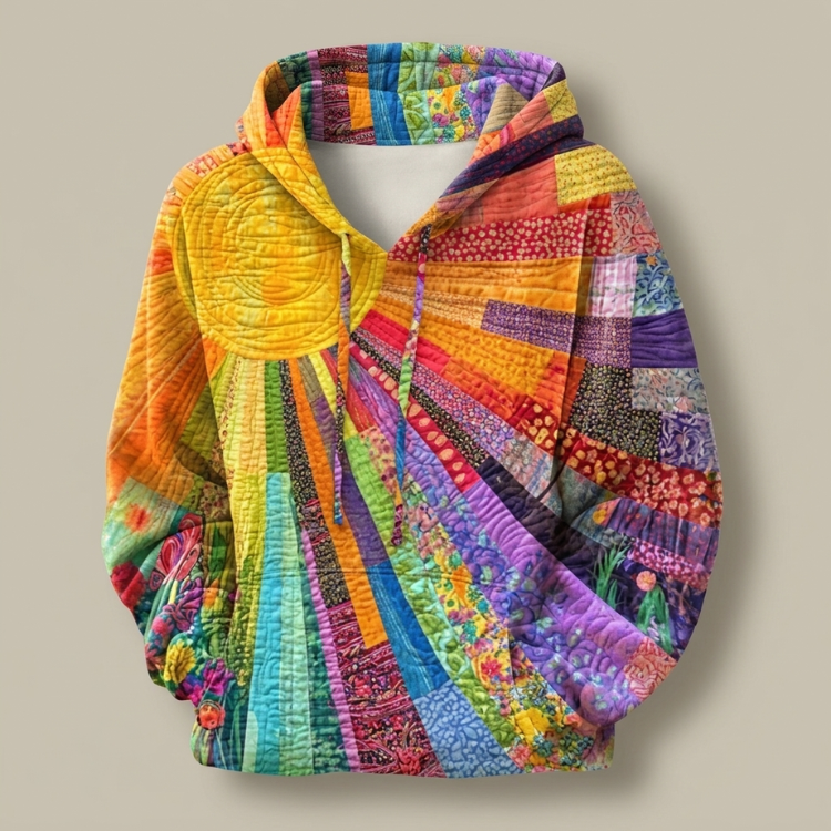 Amanda Wildflower Quilted Hoodie by Bennett and Lowe featuring floral pattern, cozy fit, and quilted fabric in soft pastel tones.
