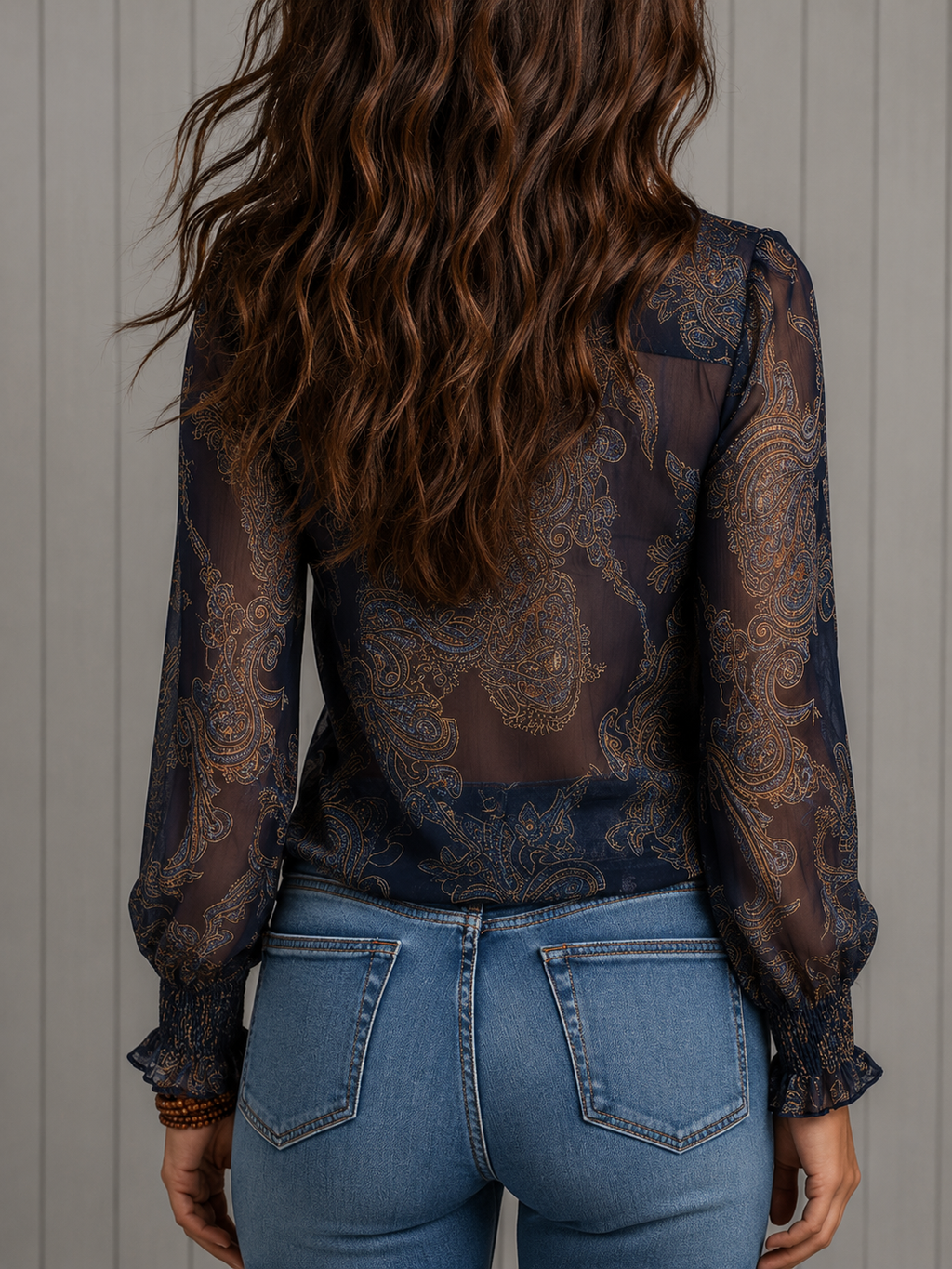 Elise Bennett and Lowe long-sleeve blouse with ruffle neckline and baroque paisley pattern for women.