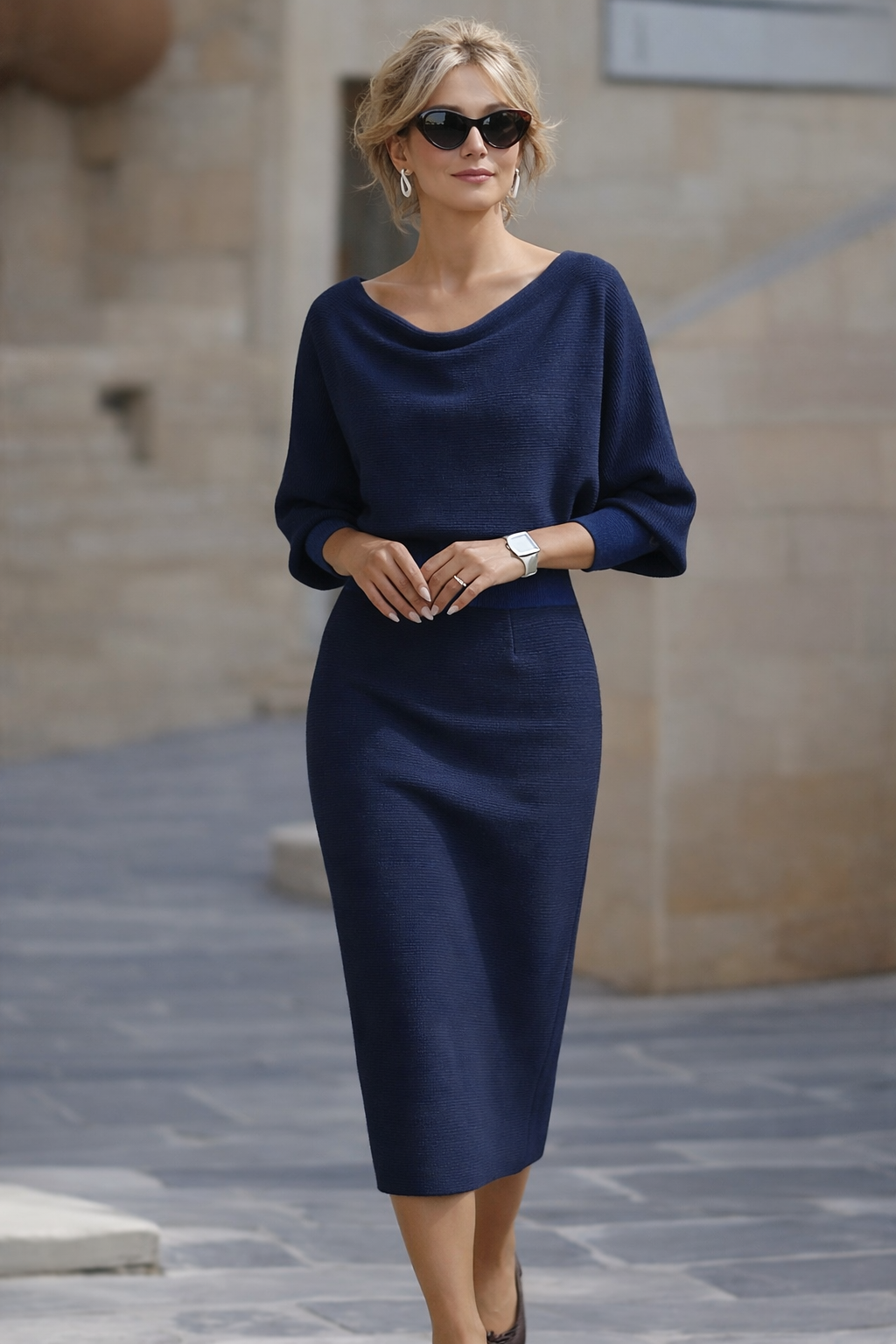 Long sleeve midi dress with draped batwing sleeves by Bennett and Lowe, featuring a flowing silhouette and elegant design.