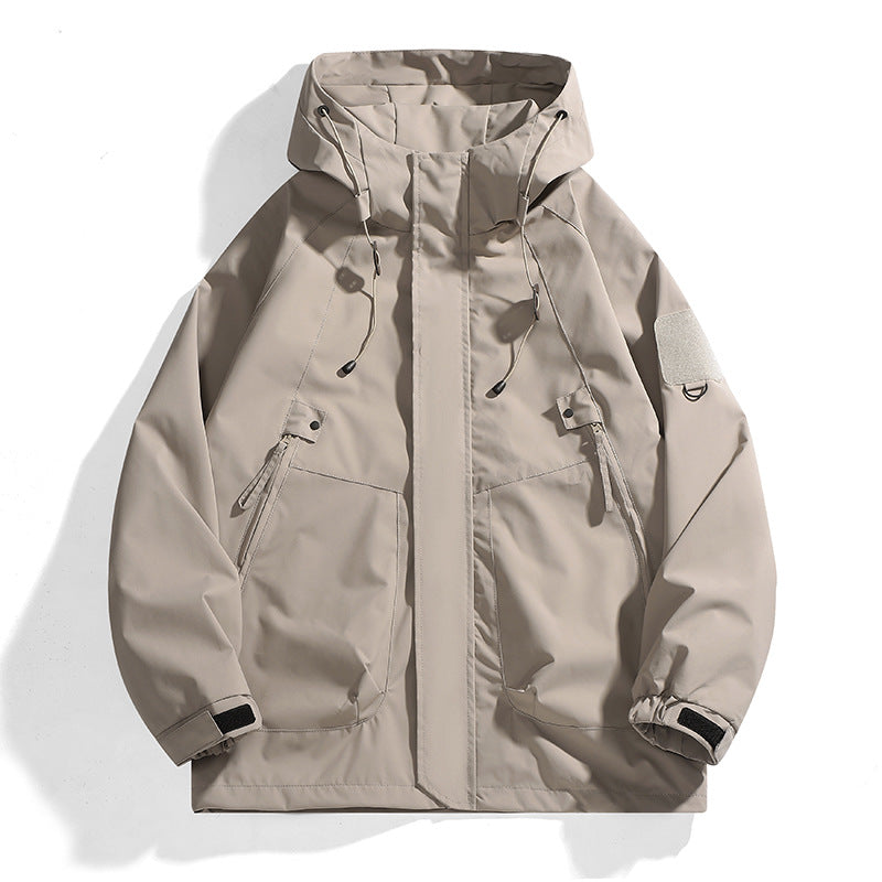 Women's waterproof outdoor jacket with adjustable hood and breathable inserts