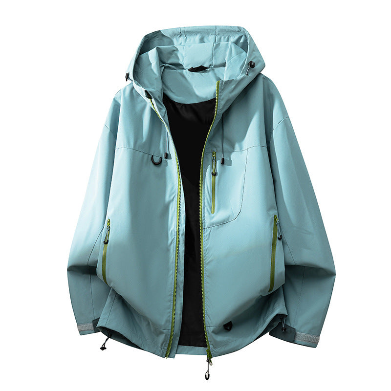 Technical outdoor jacket for women with multifunctional pockets and adjustable hood system