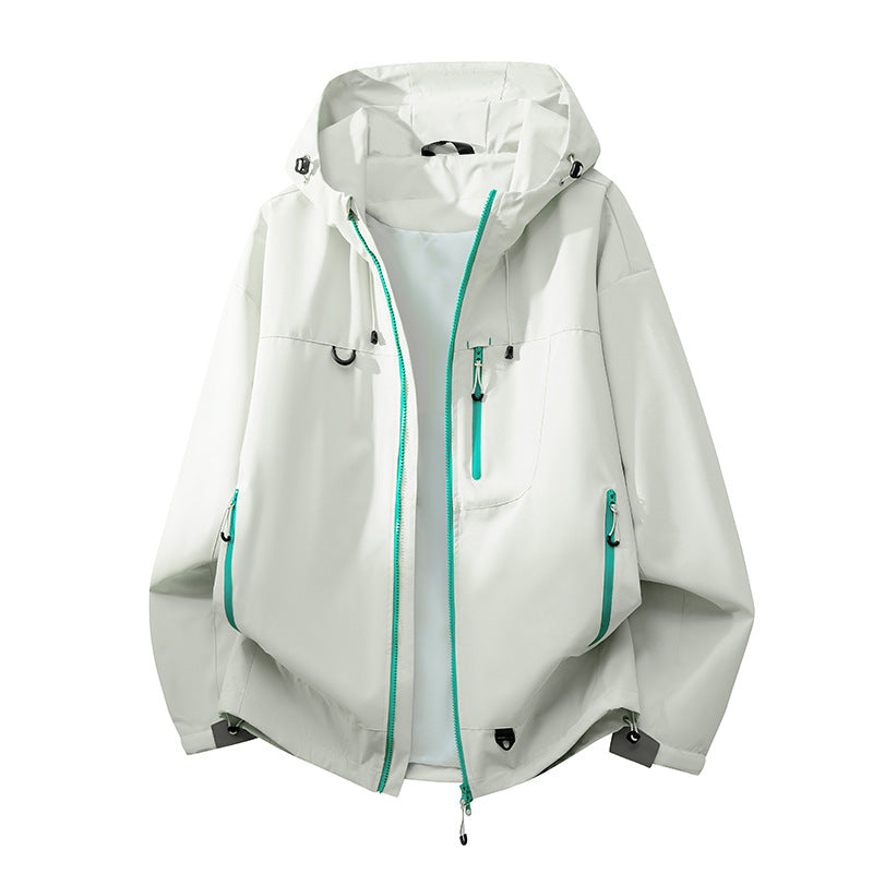 Technical outdoor jacket for women with multifunctional pockets and adjustable hood system