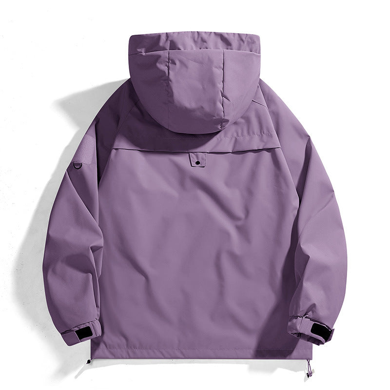 Women's waterproof outdoor jacket with adjustable hood and breathable inserts