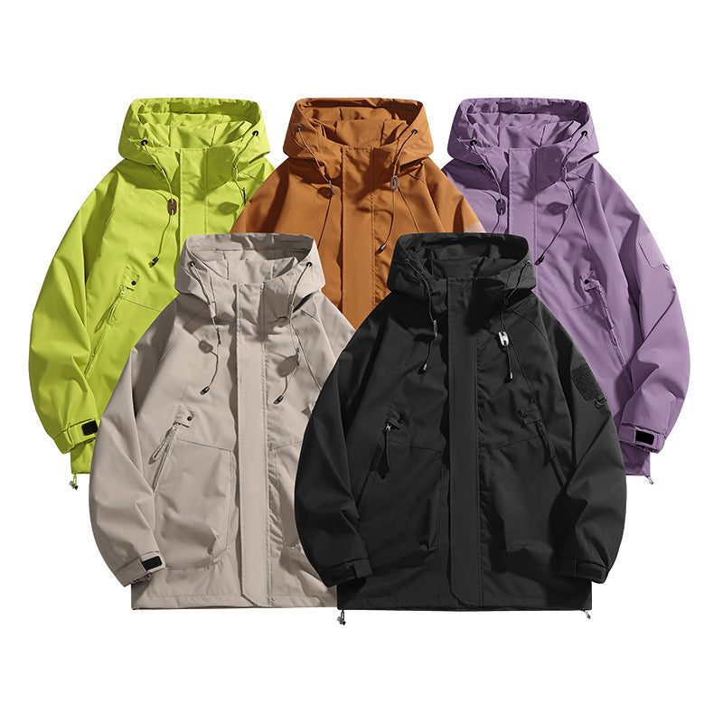 Women's waterproof outdoor jacket with adjustable hood and breathable inserts