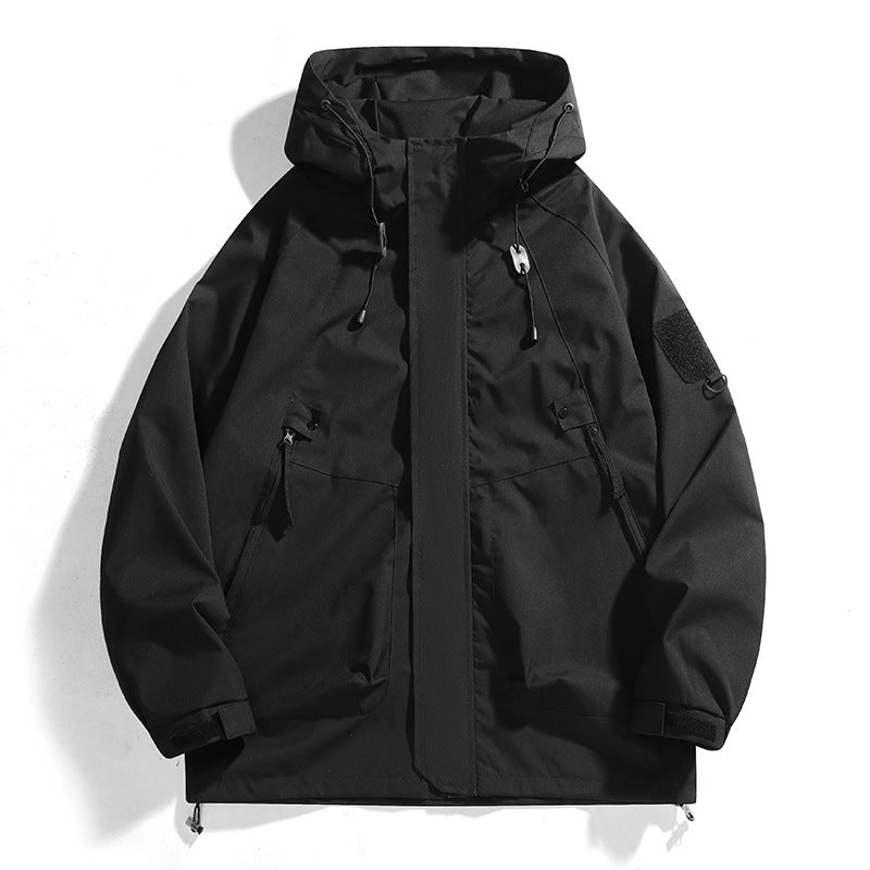 Women's waterproof outdoor jacket with adjustable hood and breathable inserts