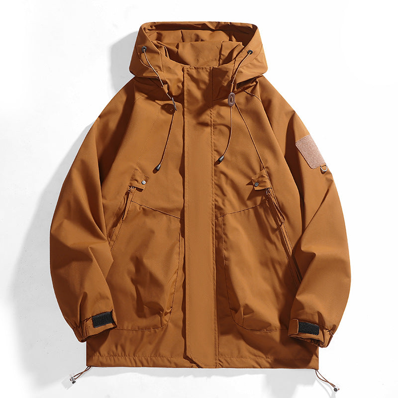 Women's waterproof outdoor jacket with adjustable hood and breathable inserts