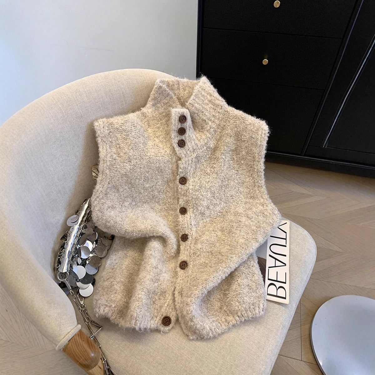 Gilet dames met fijn breisel en elegante knopen