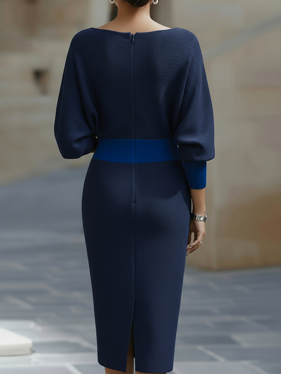 Navy Bennett and Lowe Lydia long sleeve midi dress with draped batwing sleeves, shown on a model.