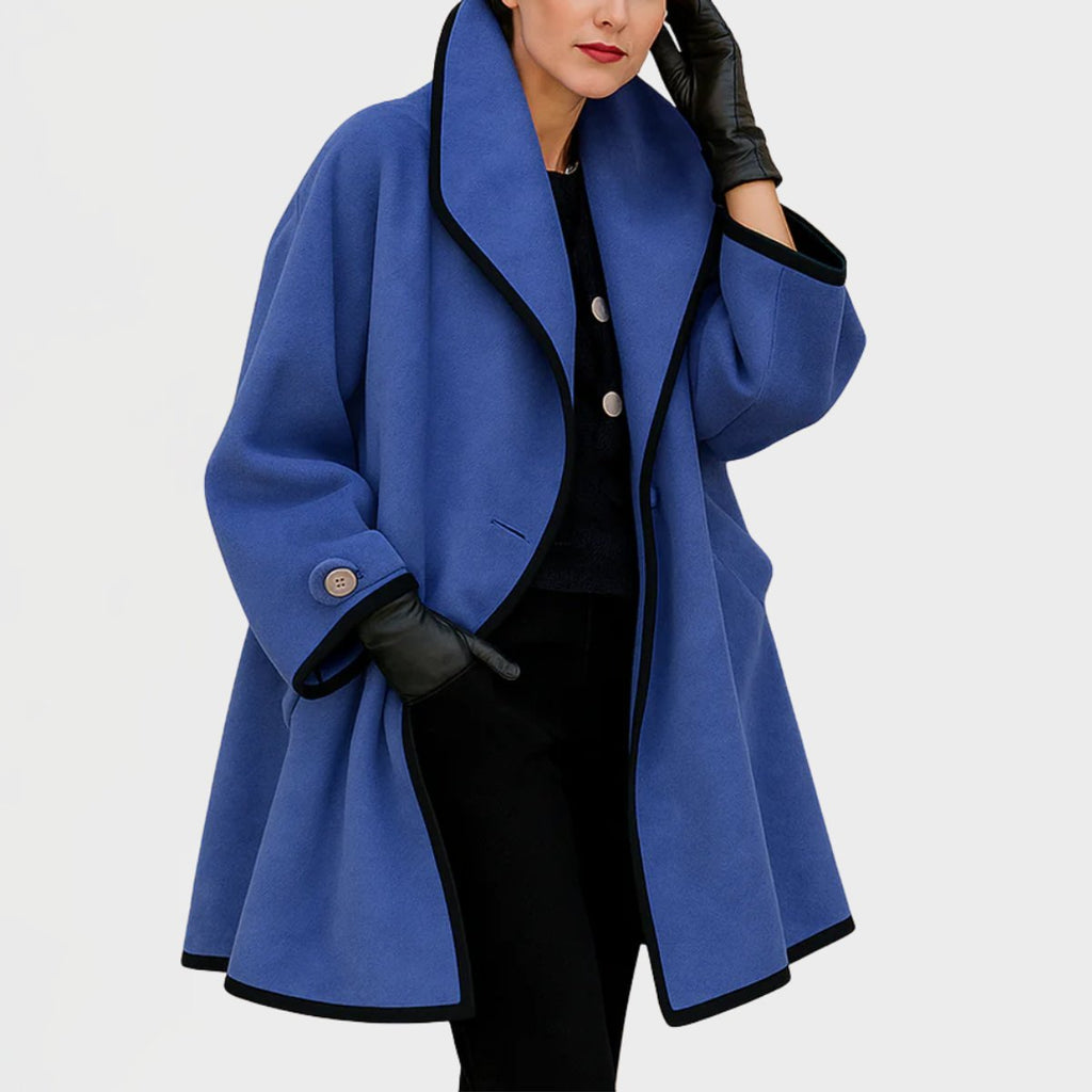 Women’s oversized wool-blend coat with contrast trim, black and cream color blocking, designed by Bennett and Lowe.